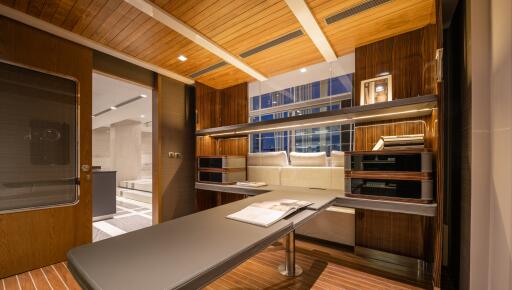 Modern home office interior with wooden finishes and contemporary furniture