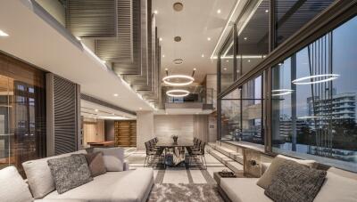 Modern open-plan living room with kitchen and dining area