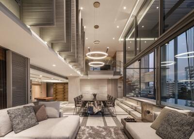 Modern open-plan living room with kitchen and dining area