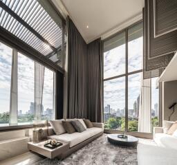 Modern living room with city view through large windows