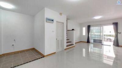 Spacious and bright living room with tiled flooring