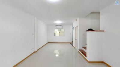 Bright and modern hallway interior with glossy tiled floors