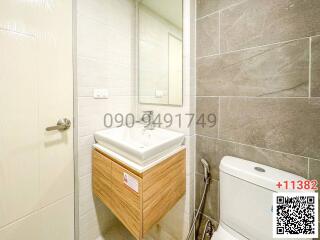 Modern bathroom with a glass shower enclosure and vanity