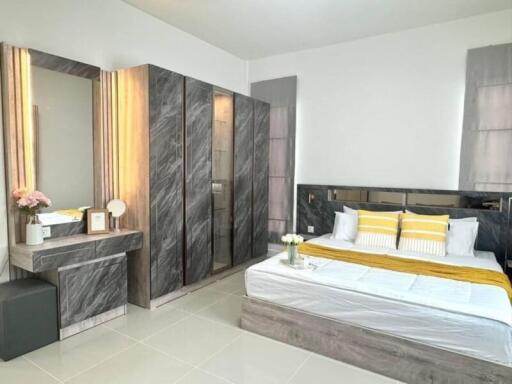Modern bedroom with a double bed and wardrobe