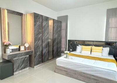 Modern bedroom with a double bed and wardrobe