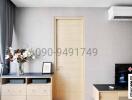 Modern bedroom interior with air conditioning unit and minimalistic decor