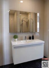 Modern bathroom with walk-in shower and vanity