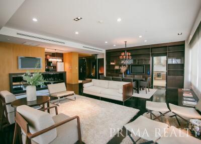 Spacious modern living room with ample seating and entertainment area