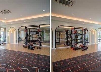 Spacious home gym with exercise equipment and large windows