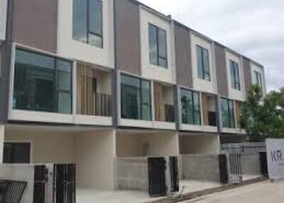 Modern residential townhouses with balconies