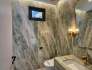 Modern bathroom with marble walls and elegant fixtures