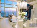 Elegant living room with a panoramic view, modern furnishings, and abundant natural light