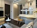 Modern living room with open kitchen design in a condo for rent in Klong Toei, Bangkok