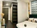 Elegant bedroom with modern design and en-suite wardrobe