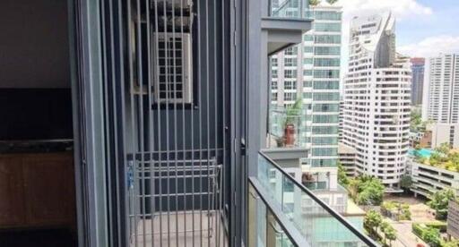 Modern apartment balcony with urban skyline view