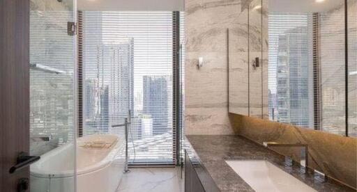 Luxurious modern bathroom with city view