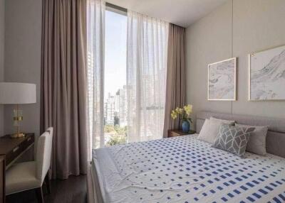 Modern bedroom with a city view