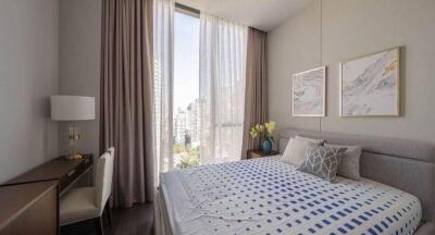 Modern bedroom with a city view