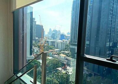 High-rise apartment balcony with city view