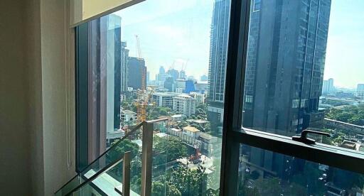 High-rise apartment balcony with city view