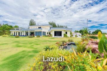 Outstanding Modern Lakeside 3 bed pool villa with 1 bed guesthouse and Maids Quarters near Black Mountain Golf Course.