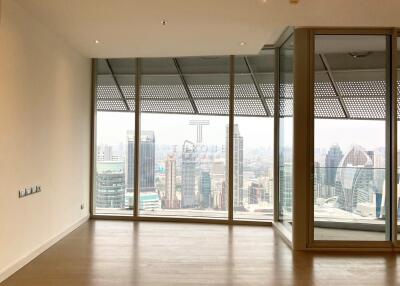 Spacious and bright unfurnished living room with large windows and city view