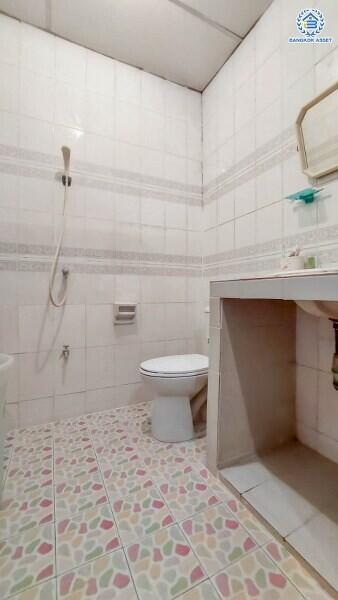 Bright and clean bathroom with tiled floors