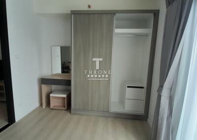 Modern bedroom with built-in wardrobe and study desk