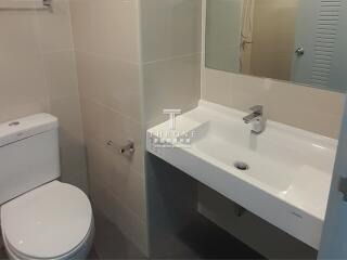 Modern bathroom with white fixtures