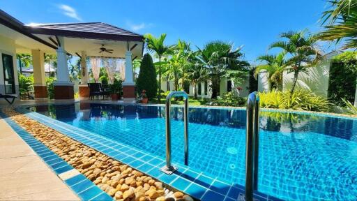 Luxurious backyard with a large swimming pool