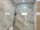 Modern bathroom interior with tiled walls