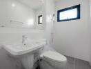 Modern bathroom interior with sanitary fittings still covered in protective plastic