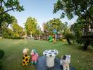 Spacious garden with a playground and seating area