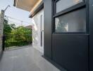 Spacious balcony with modern railing and tiled flooring