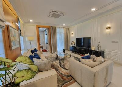 Spacious and elegantly furnished living room with modern amenities