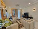 Spacious and elegantly furnished living room with modern amenities