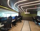 Modern office interior with dynamic lighting and workstations