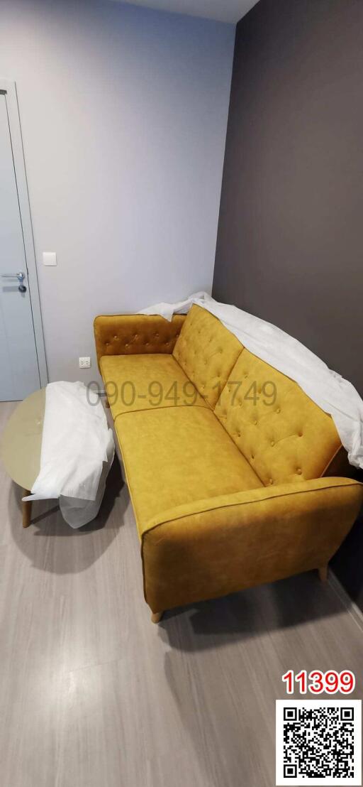 Modern bedroom with yellow sofa and grey flooring