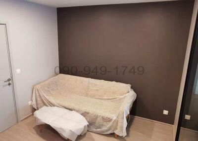 Minimalist bedroom with neutral tones and natural light