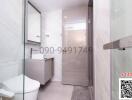 Modern bathroom interior with glass shower partition