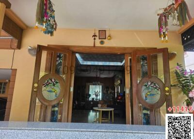 Entrance of a house with decorative stained glass doors