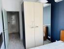 Modern bedroom interior with large wardrobe