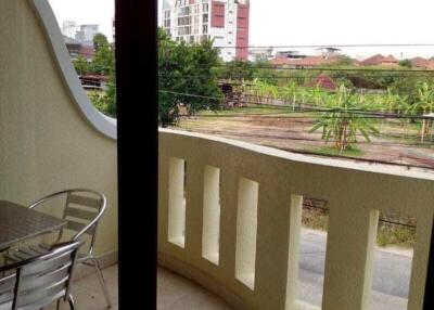 Spacious balcony with a view of the surroundings and outdoor seating