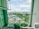 Bright balcony with city view and potted plants