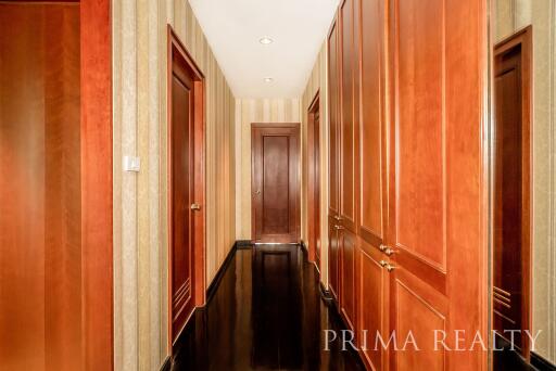 Elegant wooden-paneled corridor in a modern home