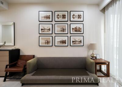 Modern living room interior with comfortable sofa and wall art