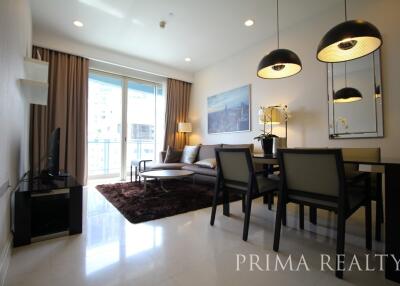 Modern living room with dining area in a bright apartment