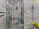 Modern Bathroom with Glass Shower and Marble Walls