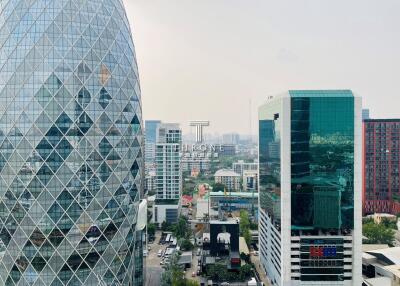 Aerial view of modern cityscape with high-rise buildings