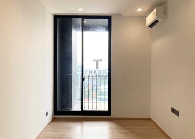 Modern empty room with large window and air conditioning unit